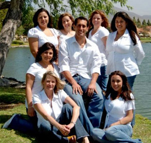 A photograph of the staff of Cruz Orthodontics.